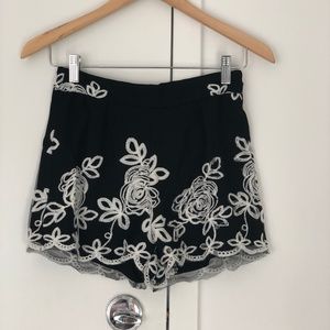 Cute black white high shorts; fun for day or party